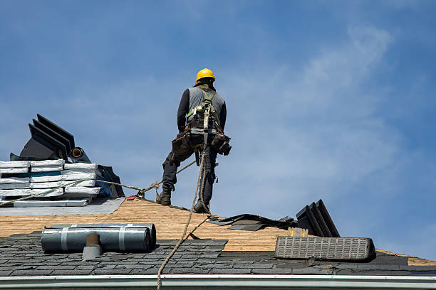 Professional Gutter Installation technician working in Byfield, MA
